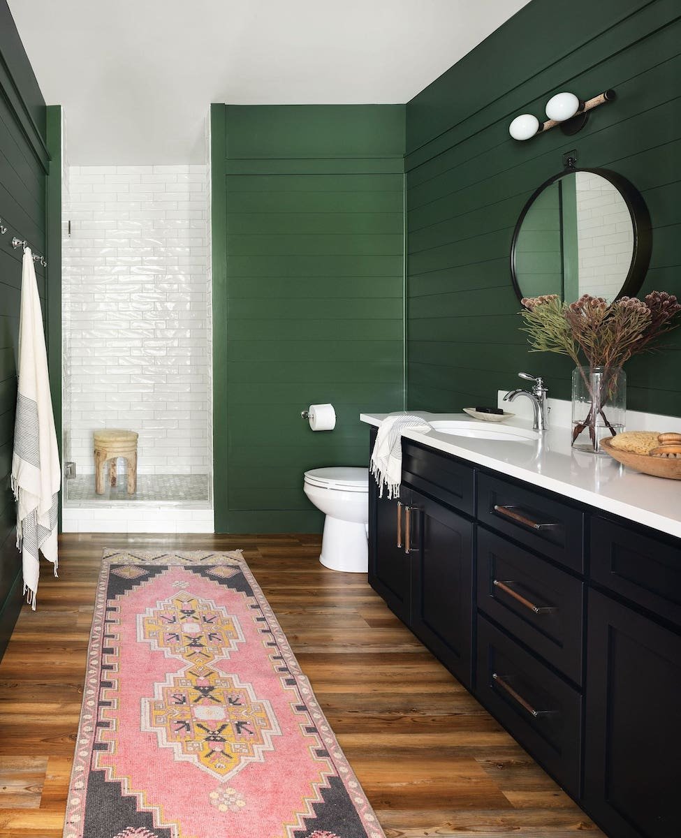 black shaker cabinets in green bathroom in party barn by stephanie kraus designs